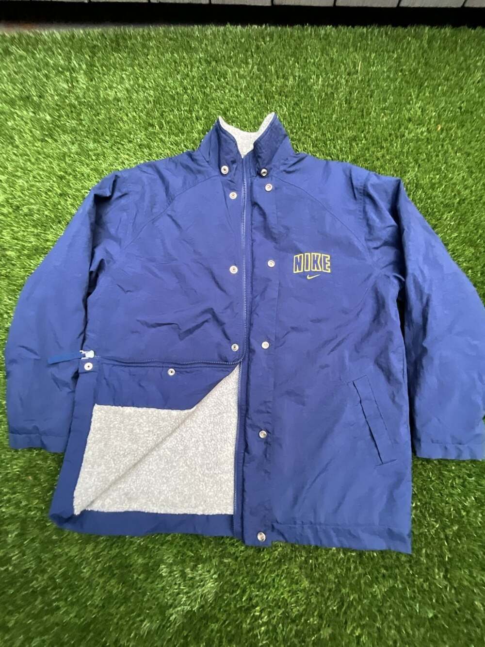 Vintage Nike Men's Blue Nylon/Fleece Lined Snap and Zipper Front Jacket